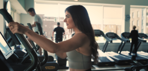 Woman on crosstrainer at The Lensbury gym